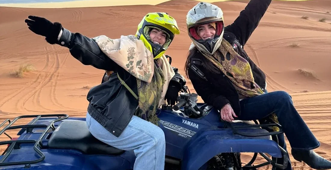 Quad biking in the Erg Chebbi dunes during a Marrakech to Fes desert tour via Merzouga