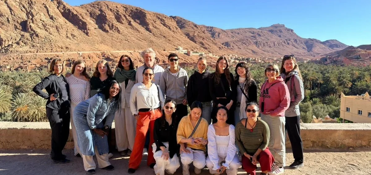 Group photo near Todra Gorge during the 5 days desert tour from Marrakech to Fes via Merzouga